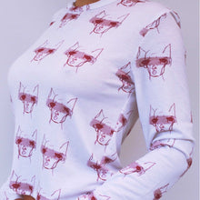Load image into Gallery viewer, Fashion model wearing illustrated print of pink pig on a white jersey long sleeved T-Shirt.
